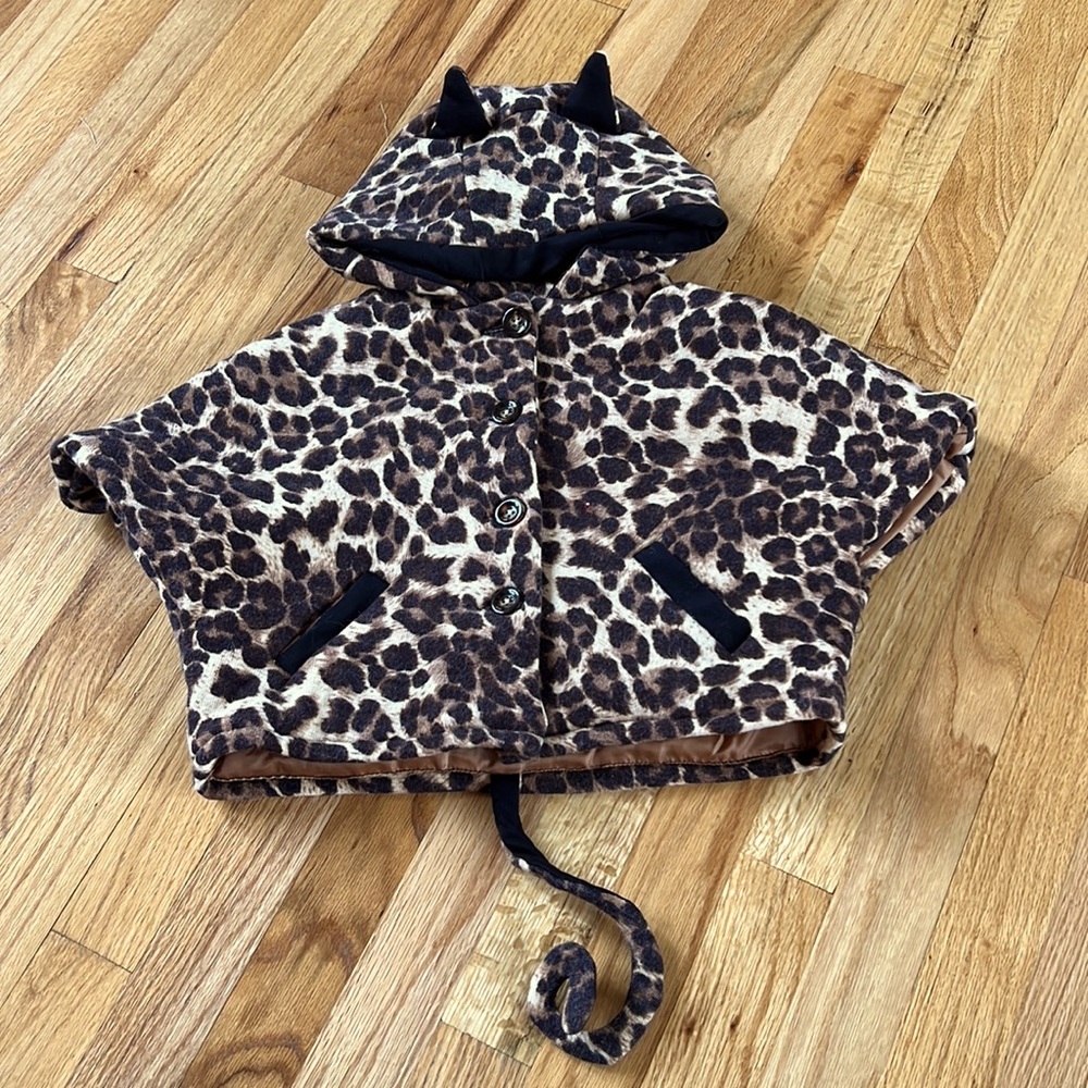 Beautiful size 6-8 leopard/cheata print girls poncho/jacket. Worn once!